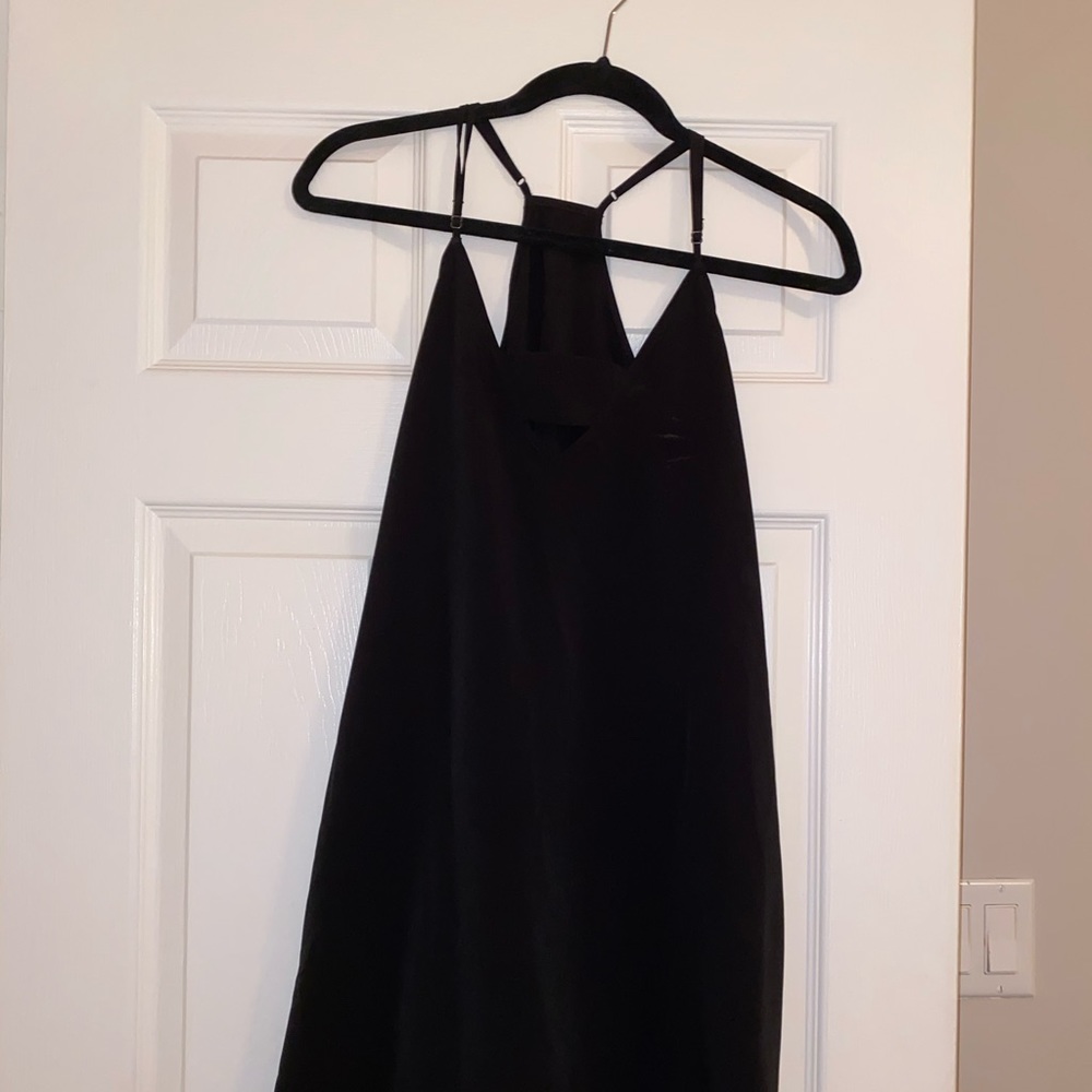 Flowy Black dress w/ small opening at top
